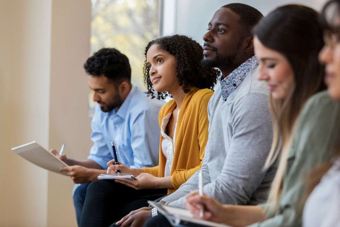 group of employees partaking in a company training.jpg
